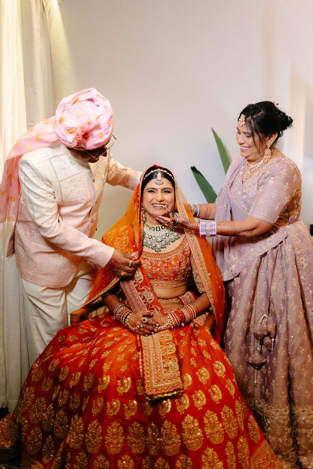 Family dressing the bride